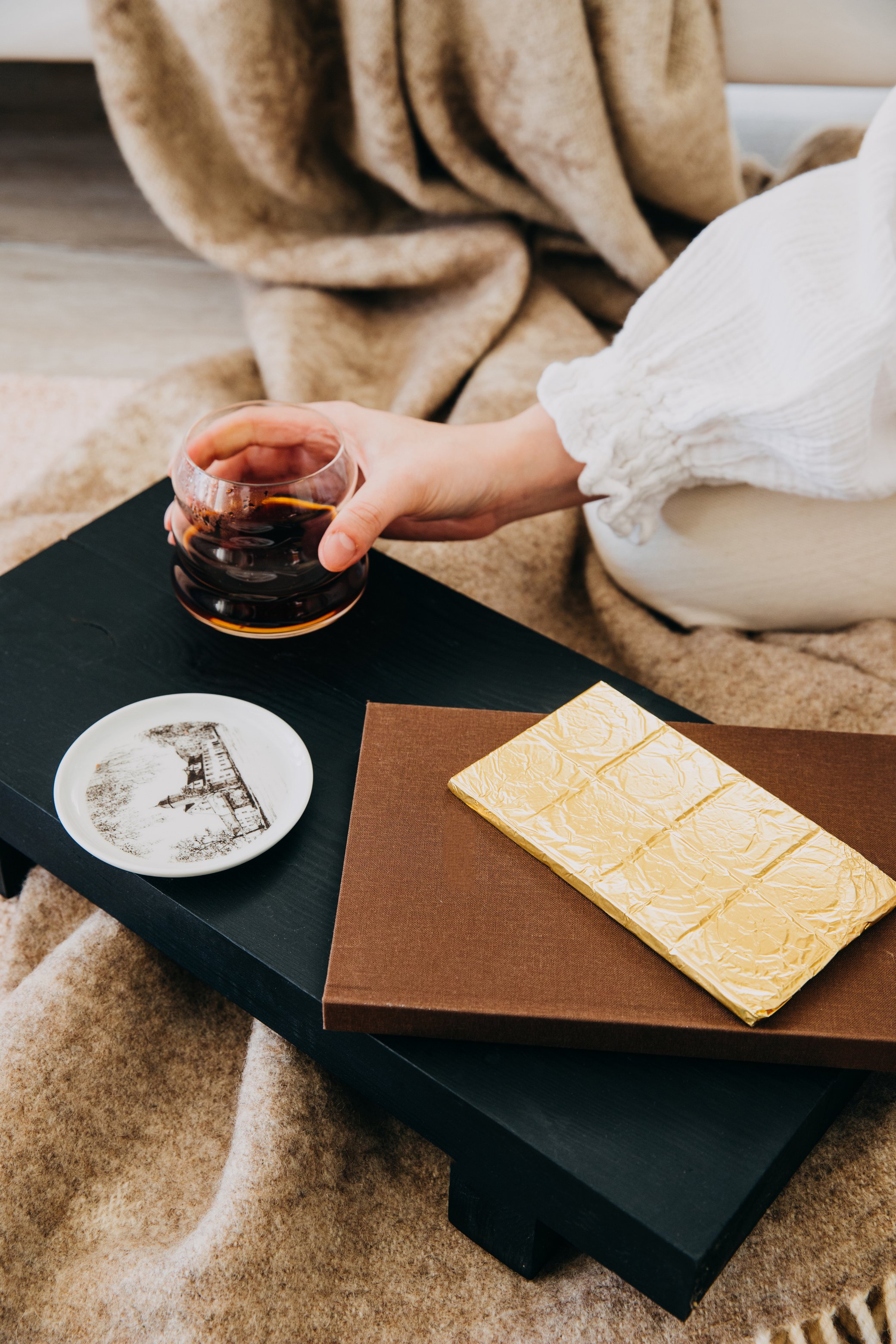 Woman Putting Glass on Breakfast Tray